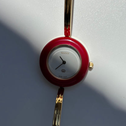 Gucci 1990s Interchangeable Bezel Gold Plated Bangle Watch with 12 bezels, case