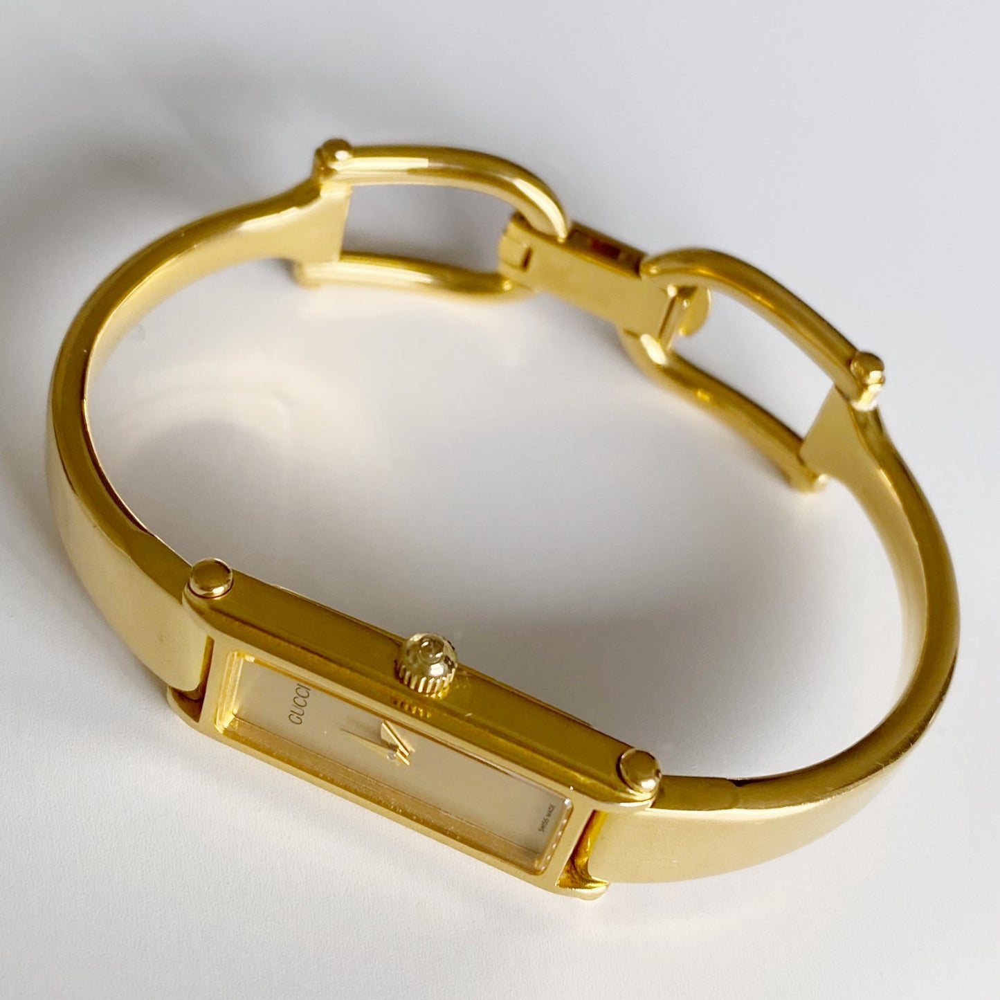 Gucci 1990s Gold Dial Rectangular  Gold Plated Bangle Watch