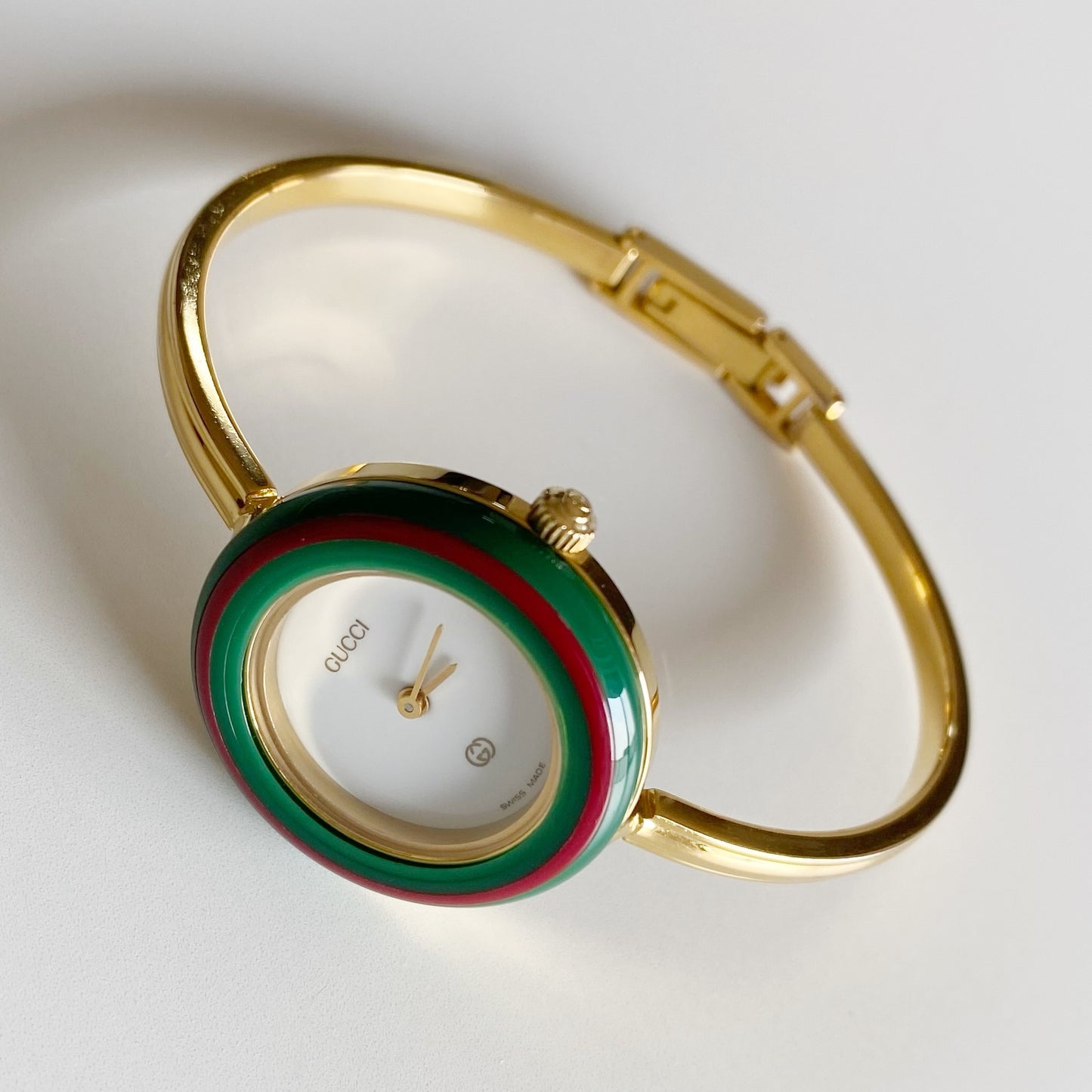 Gucci 1990s Interchangeable Bezel Gold Plated Bangle Watch with 12 bezels, case