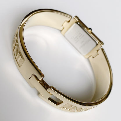 Yves Saint Laurent 1990s Seashell Dial Gold Plated Bangle Watch