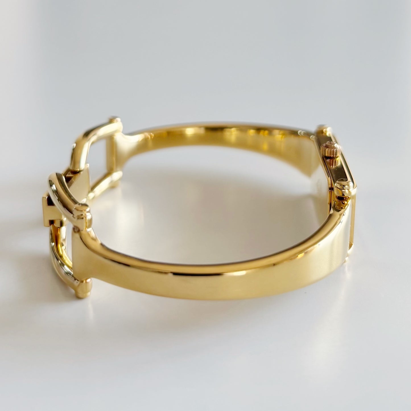 Gucci 1990s Black Rectangular Dial Gold Plated Bangle Watch