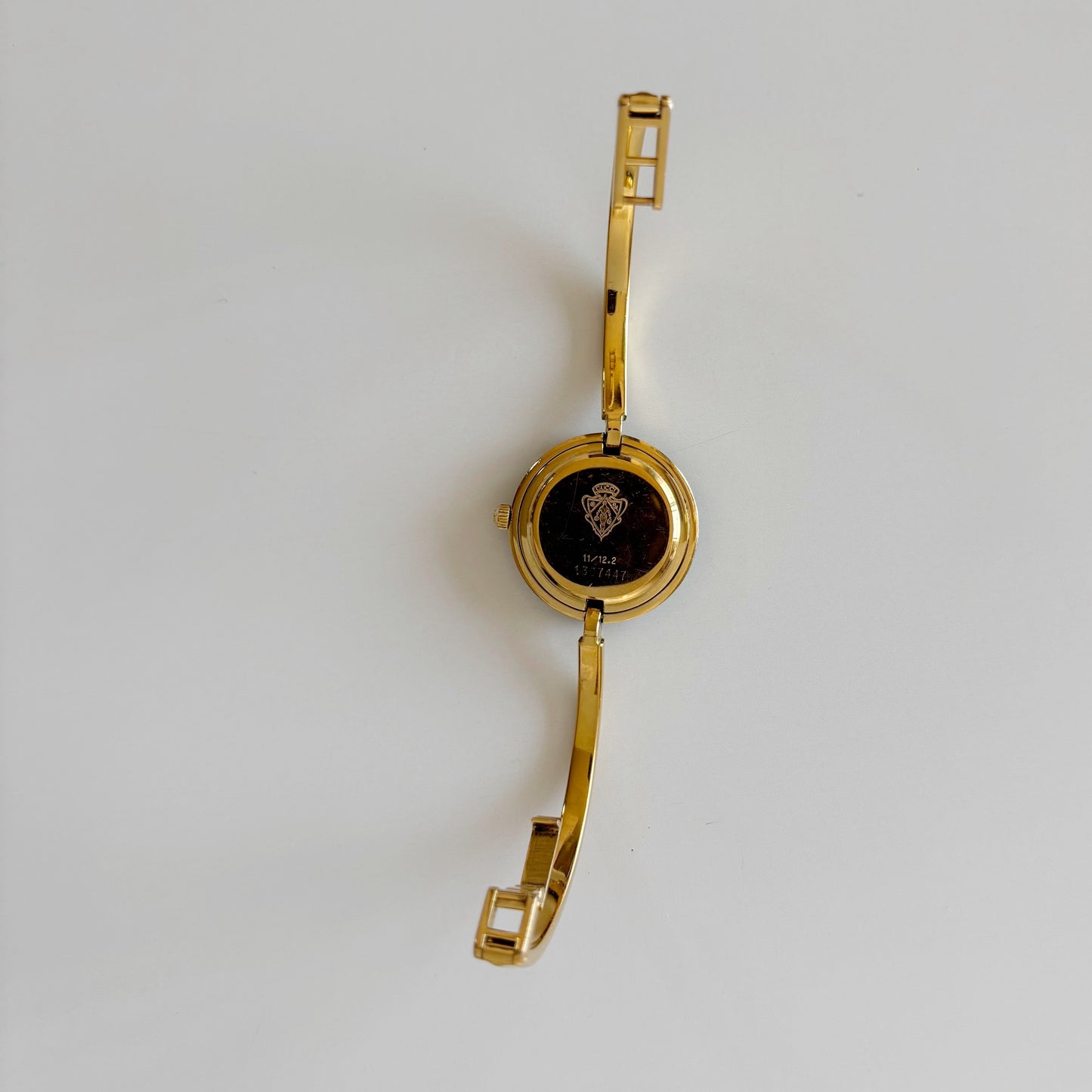 Gucci 1990s Interchangeable Bezel Gold Plated Bangle Watch with 12 bezels, case