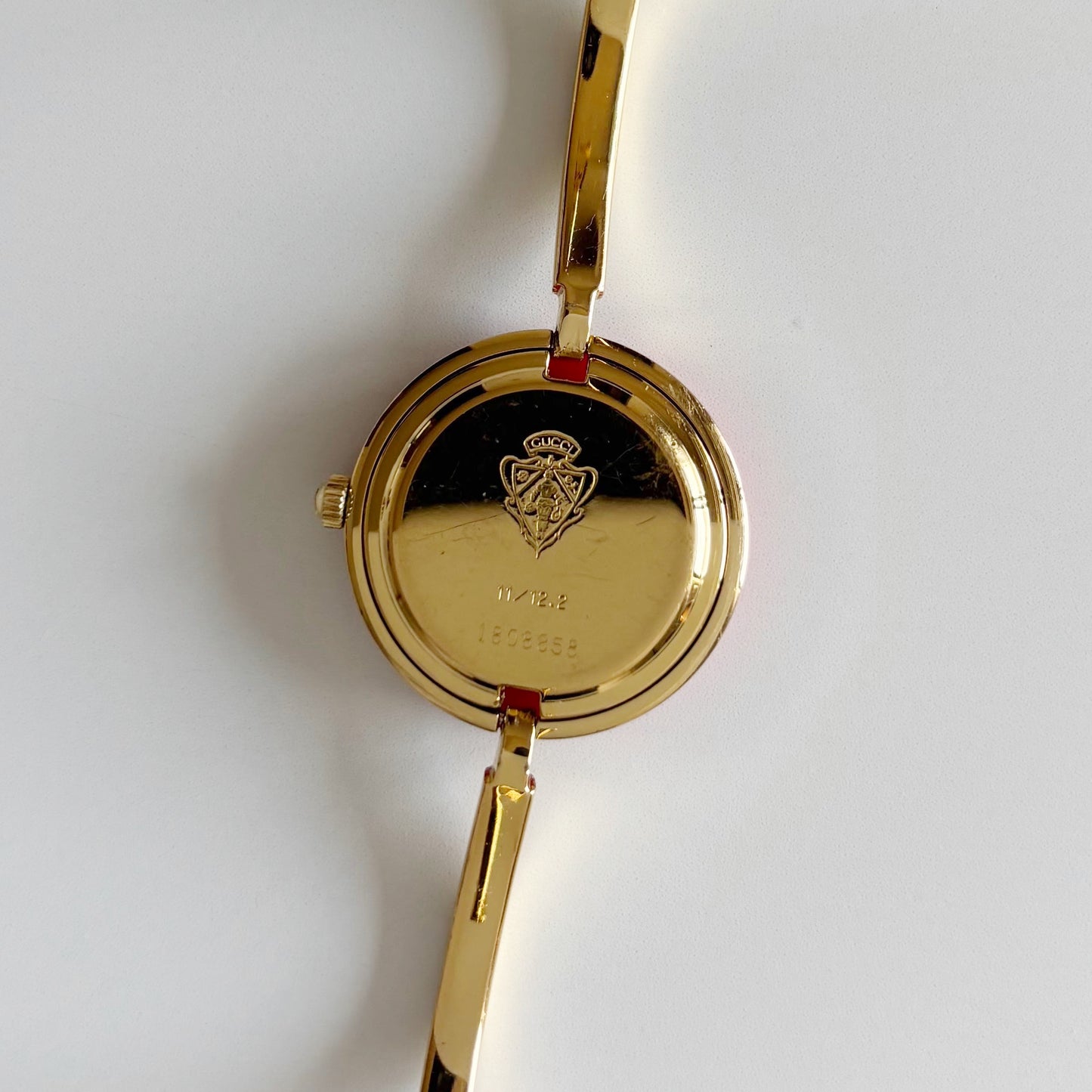 Gucci 1990s Interchangeable Bezel Gold Plated Bangle Watch with 12 bezels, case