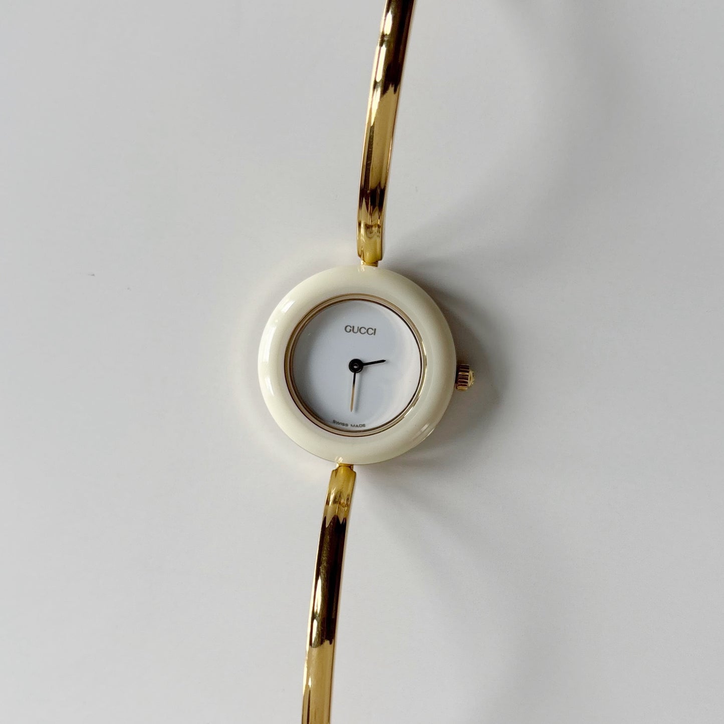 Gucci 1990s Interchangeable Bezel Gold Plated Bangle Watch with 12 bezels, case