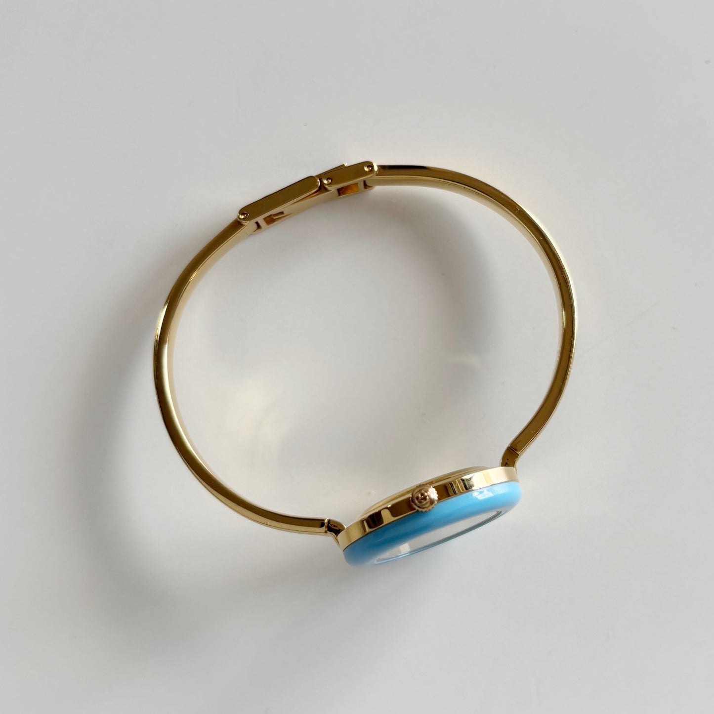 Gucci 1990s Interchangeable Bezel Gold Plated Bangle Watch with 12 bezels, case