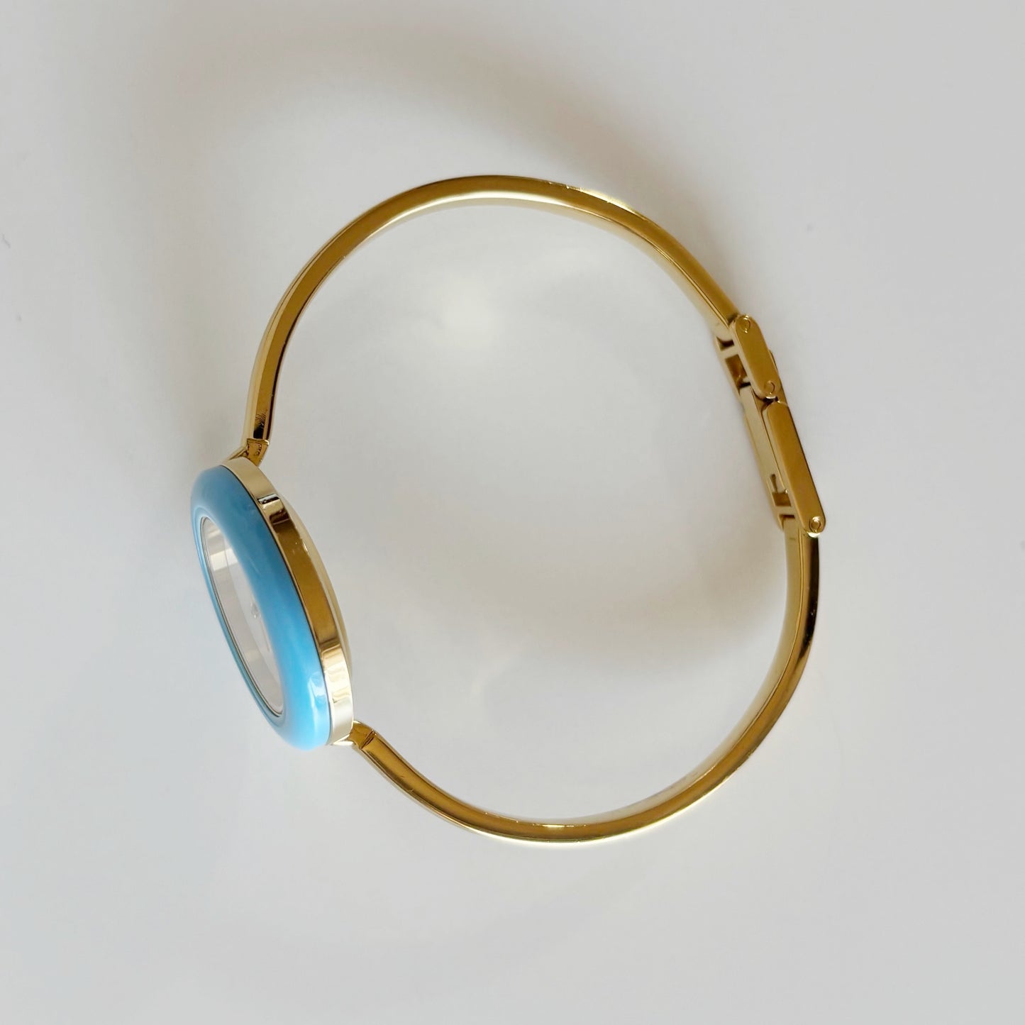 Gucci 1990s Interchangeable Bezel Gold Plated Bangle Watch with 12 bezels, case