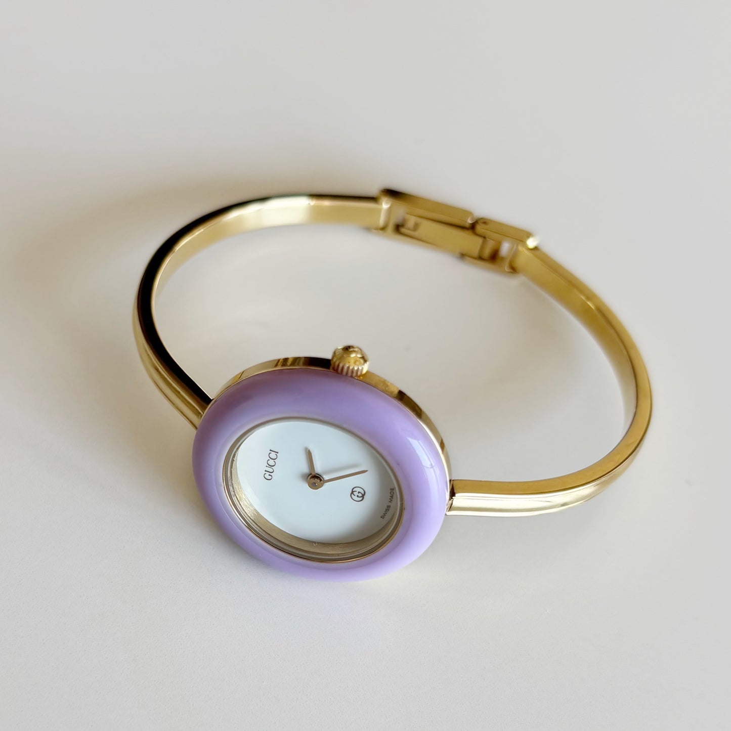 Gucci 1990s Interchangeable Bezel Gold Plated Bangle Watch with 12 bezels, case