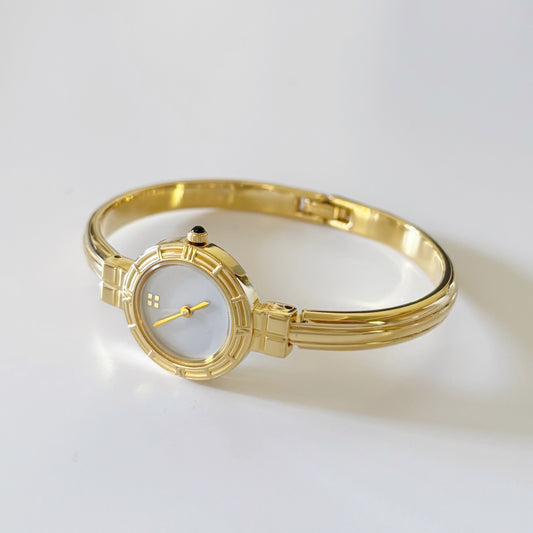 Yves Saint Laurent Seashell Dial Gold Plated Bangle Watch