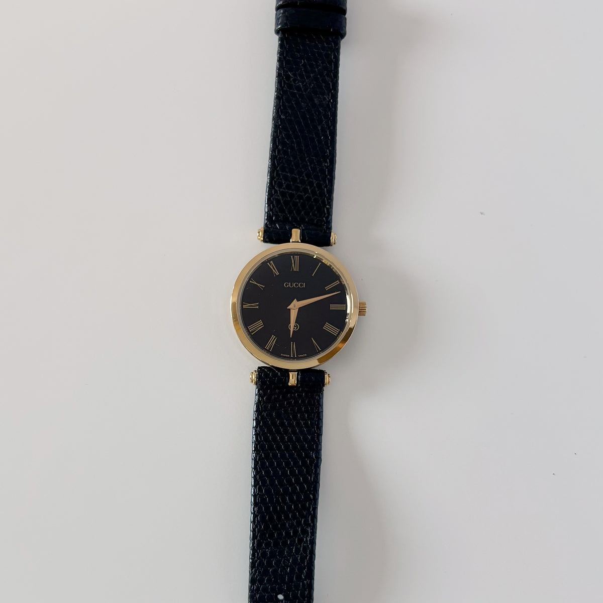 Gucci 1980s Round Black Dial Gold-Plated Watch (Large)