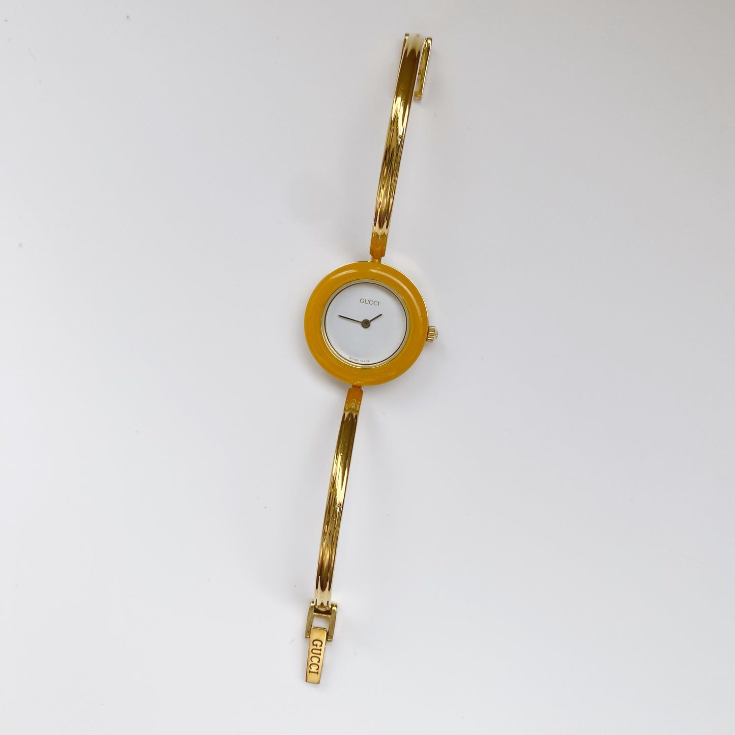 Gucci 1990s Interchangeable Bezel Gold Plated Bangle Watch with 12 bezels, case