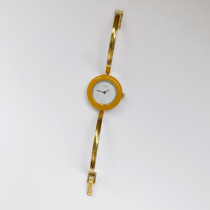 Gucci 1990s Interchangeable Bezel Gold Plated Bangle Watch with 12 bezels, case