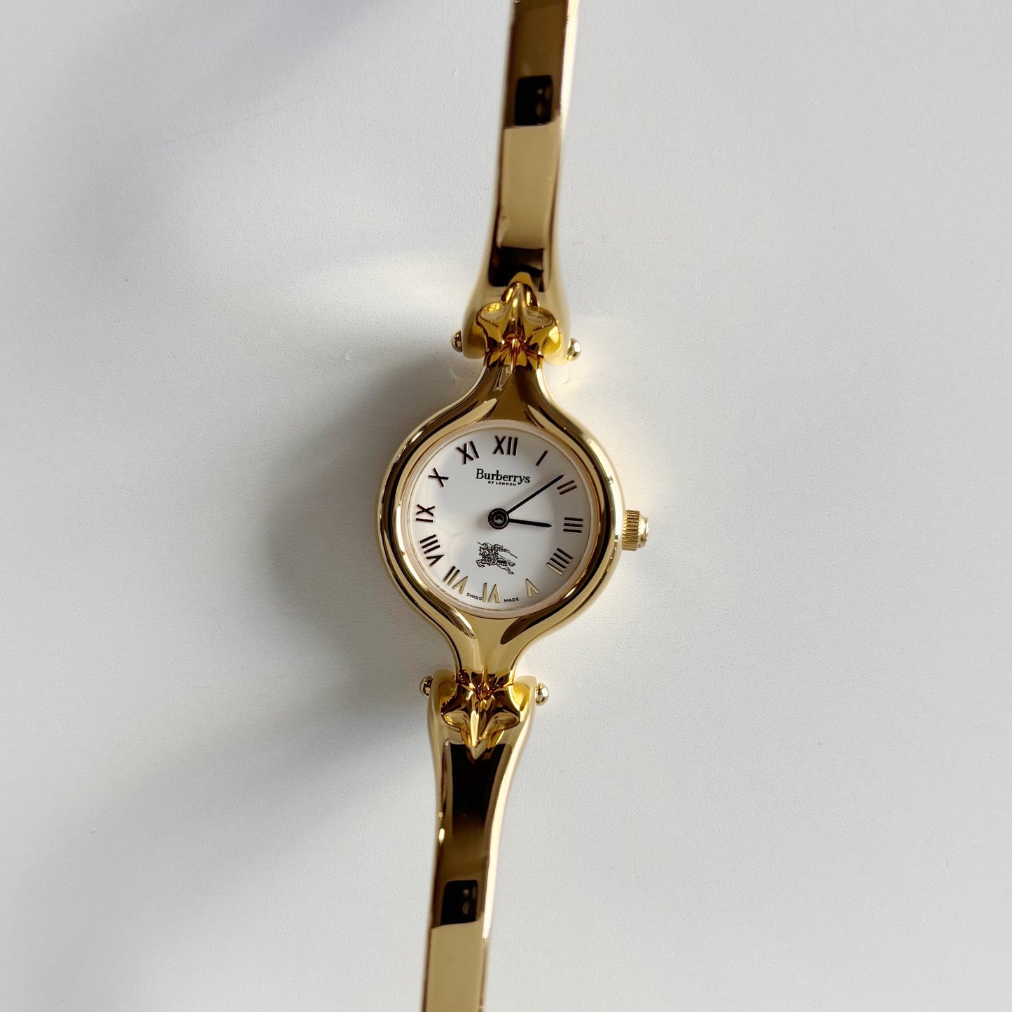 Burberry 1990s Round Dial Gold Plated Bangle Watch