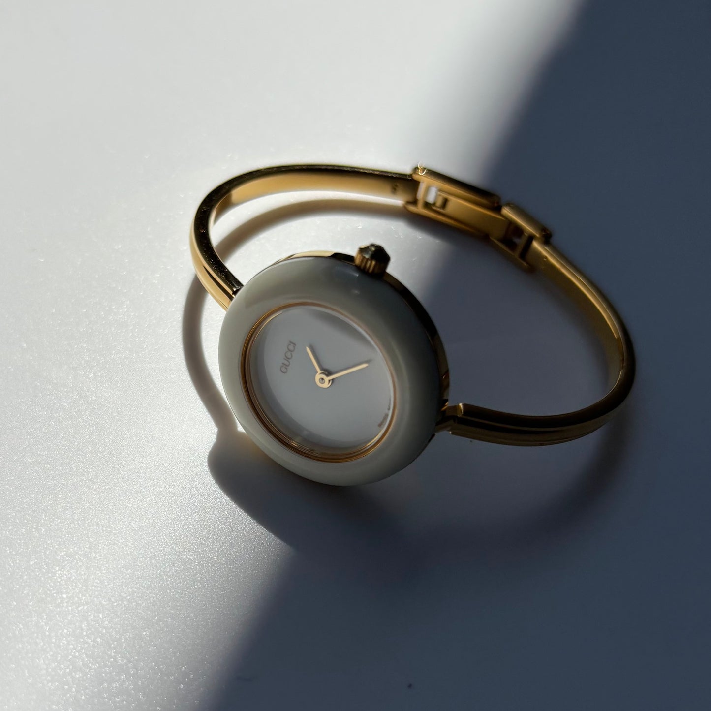 Gucci 1990s Interchangeable Bezel Gold Plated Bangle Watch with case, 12 bezels (Small)