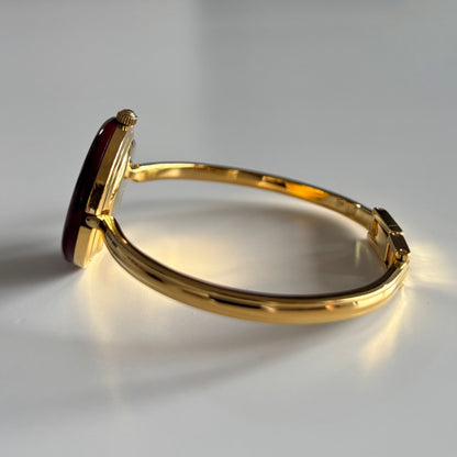 Gucci 1990s Interchangeable Bezel Gold Plated Bangle Watch with 12 bezels, case