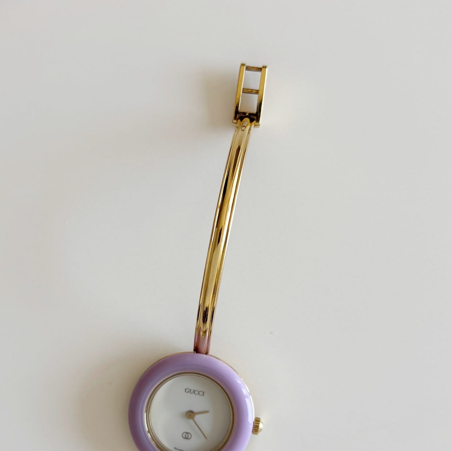 Gucci 1990s Interchangeable Bezel Gold Plated Bangle Watch with 12 bezels, case