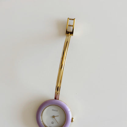 Gucci 1990s Interchangeable Bezel Gold Plated Bangle Watch with 12 bezels, case