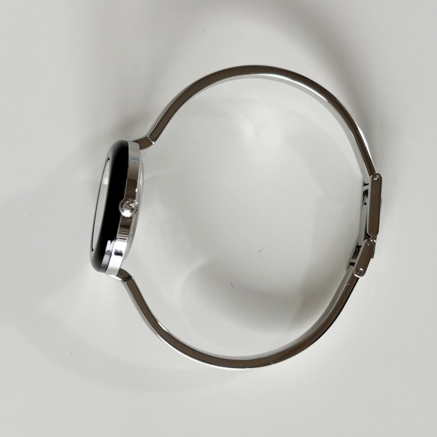 Gucci 1990s Interchangeable Bezel Stainless steel Bangle Watch with 12 bezels, case