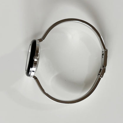 Gucci 1990s Interchangeable Bezel Stainless steel Bangle Watch with 12 bezels, case