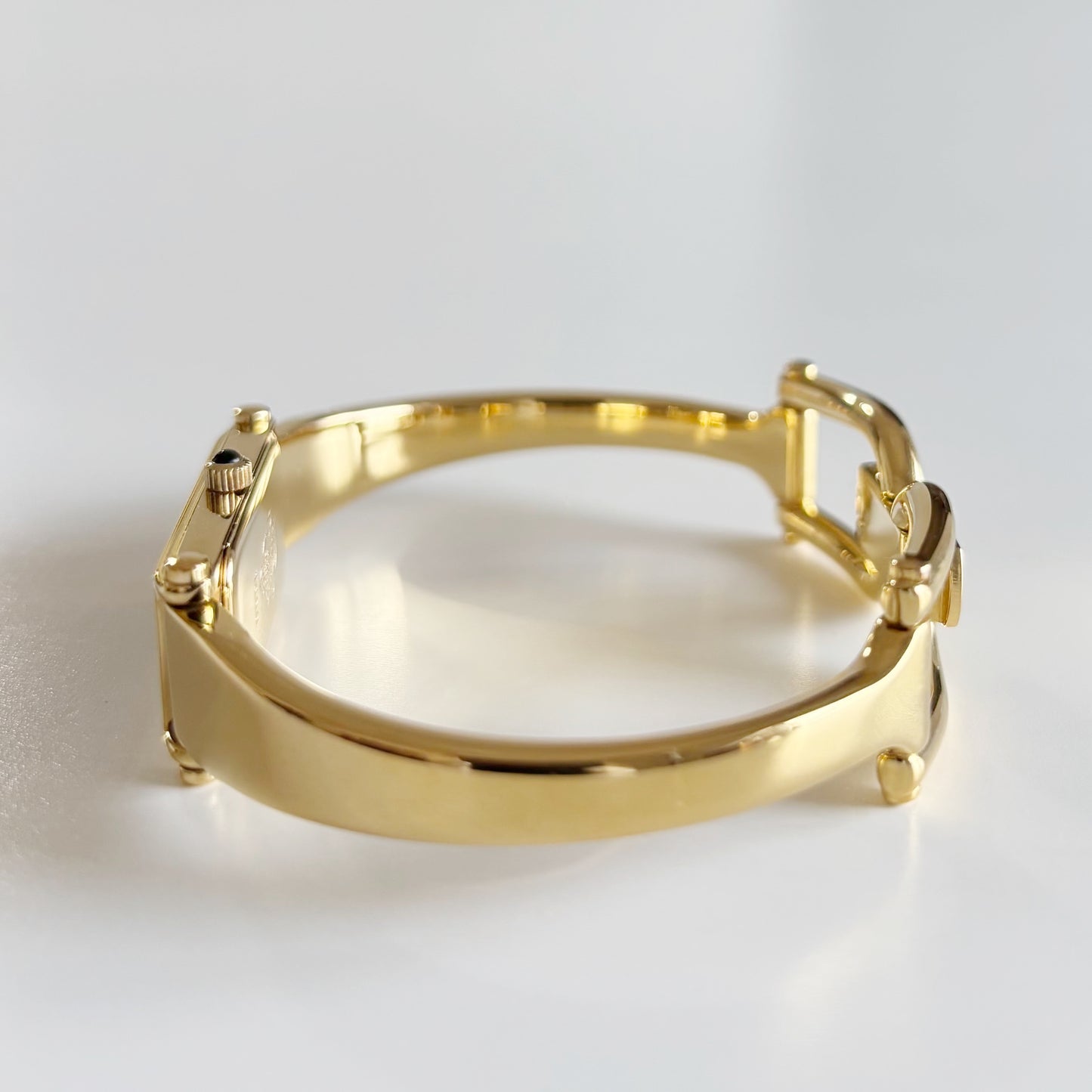Gucci 1990s Black Dial Rectangular Gold Plated Bangle Watch