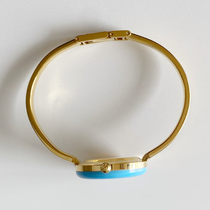 Gucci 1990s Interchangeable Bezel Gold Plated Bangle Watch with 12 bezels, case