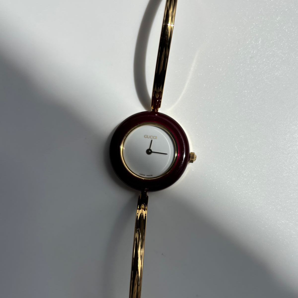 Gucci 1990s Interchangeable Bezel Gold Plated Bangle Watch with 12 bezels, case