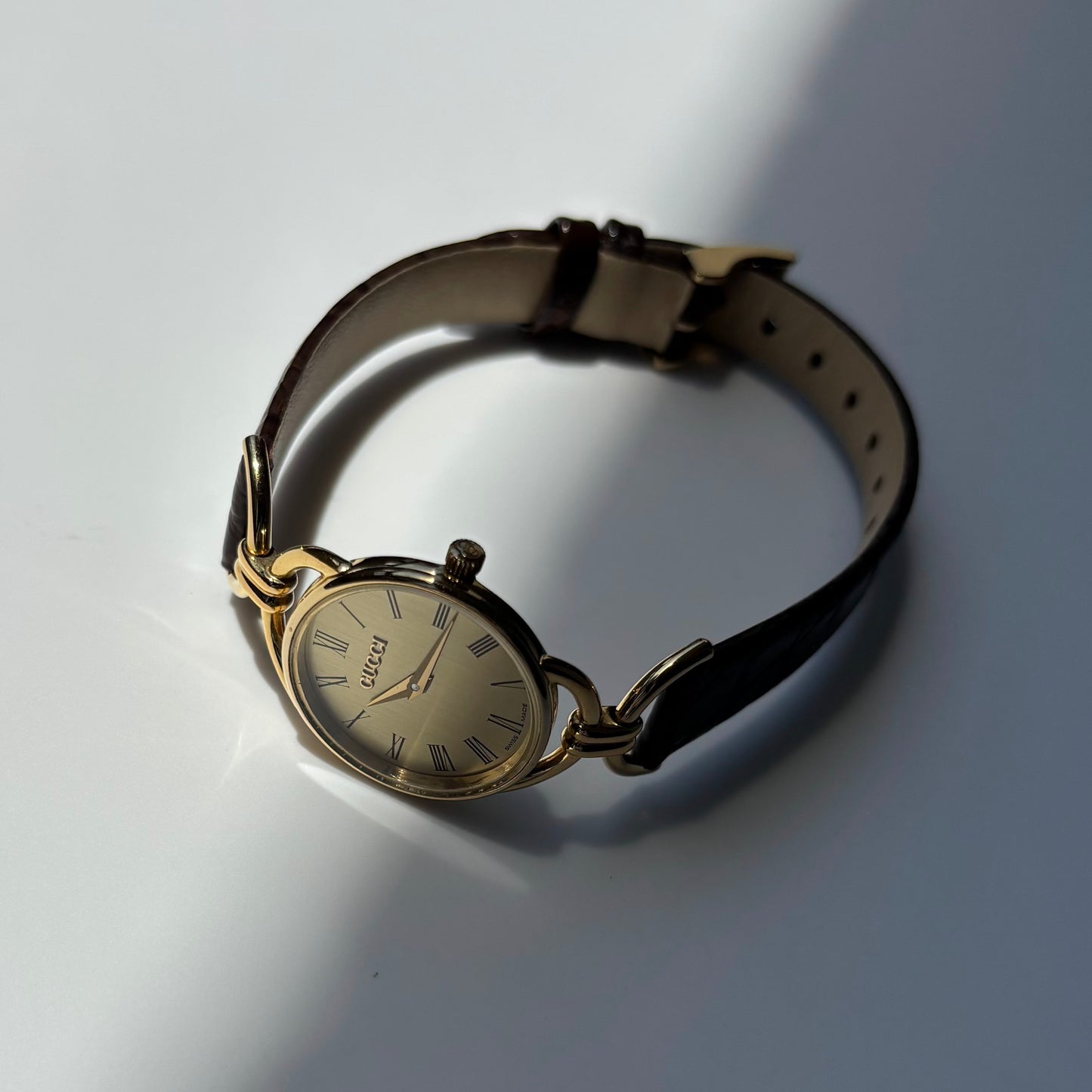 Gucci 1990s Gold Round Dial Horsebit Gold Plated Watch