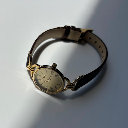 Gucci 1990s Gold Round Dial Horsebit Gold Plated Watch