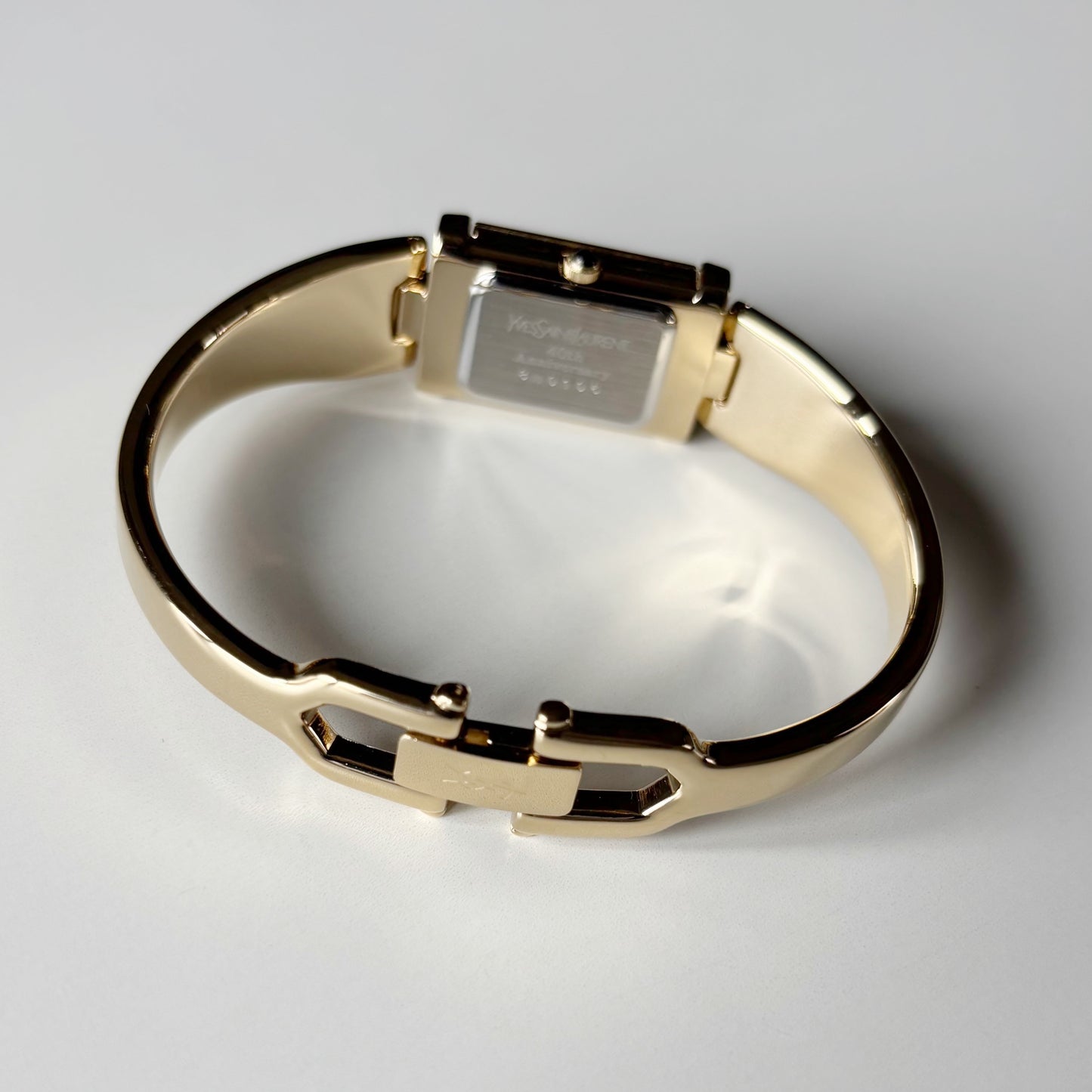 Yves Saint Laurent 1990s Peek-A-Boo Gold Plated Bangle Watch