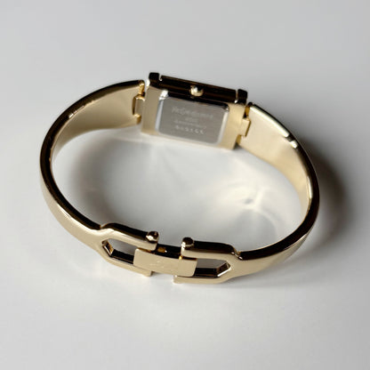 Yves Saint Laurent 1990s Peek-A-Boo Gold Plated Bangle Watch