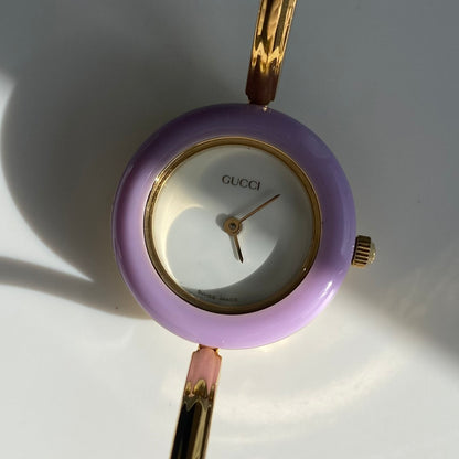 Gucci 1990s Interchangeable Bezel Gold Plated Bangle Watch with 12 bezels, case