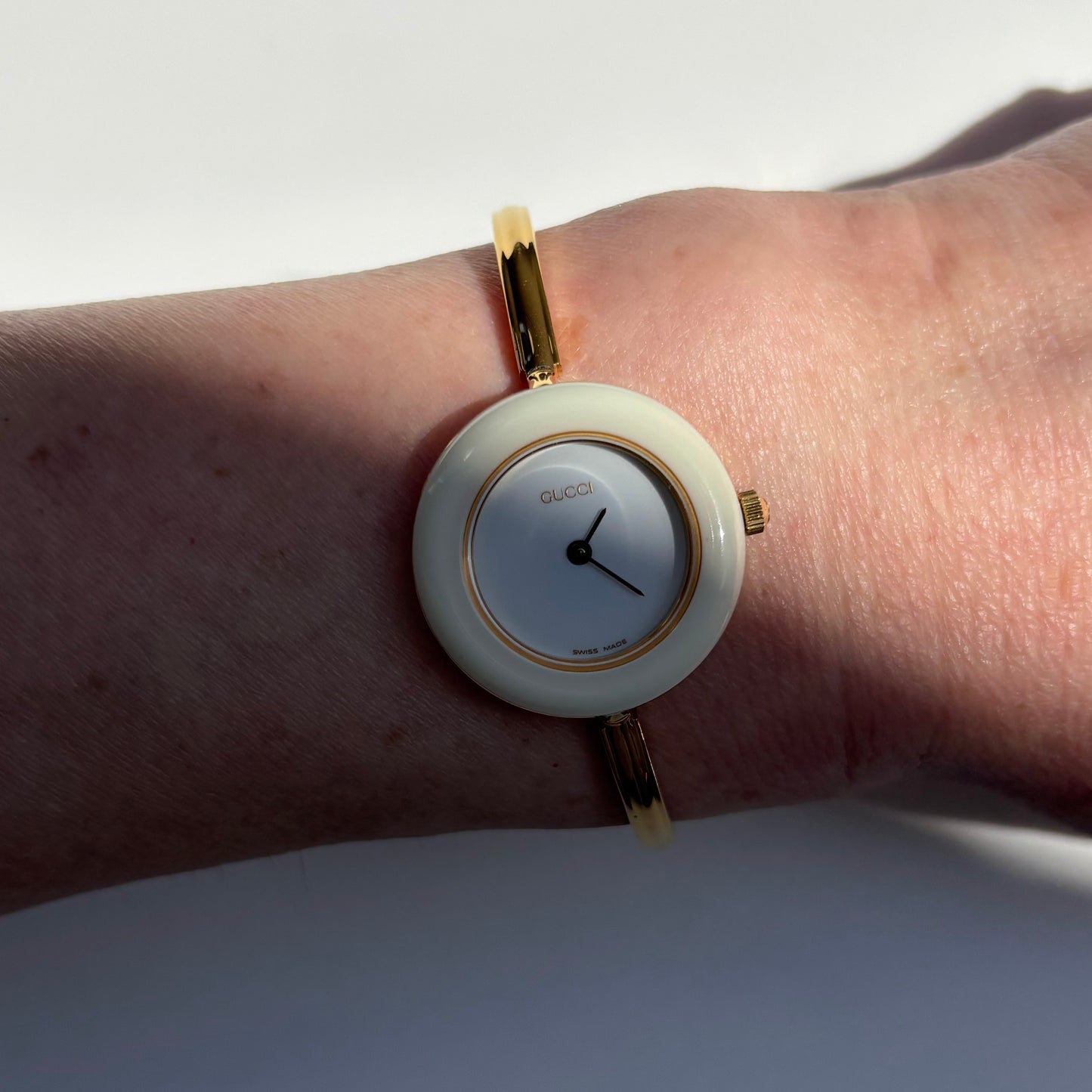 Gucci 1990s Interchangeable Bezel Gold Plated Bangle Watch with case, 12 bezels (Small)