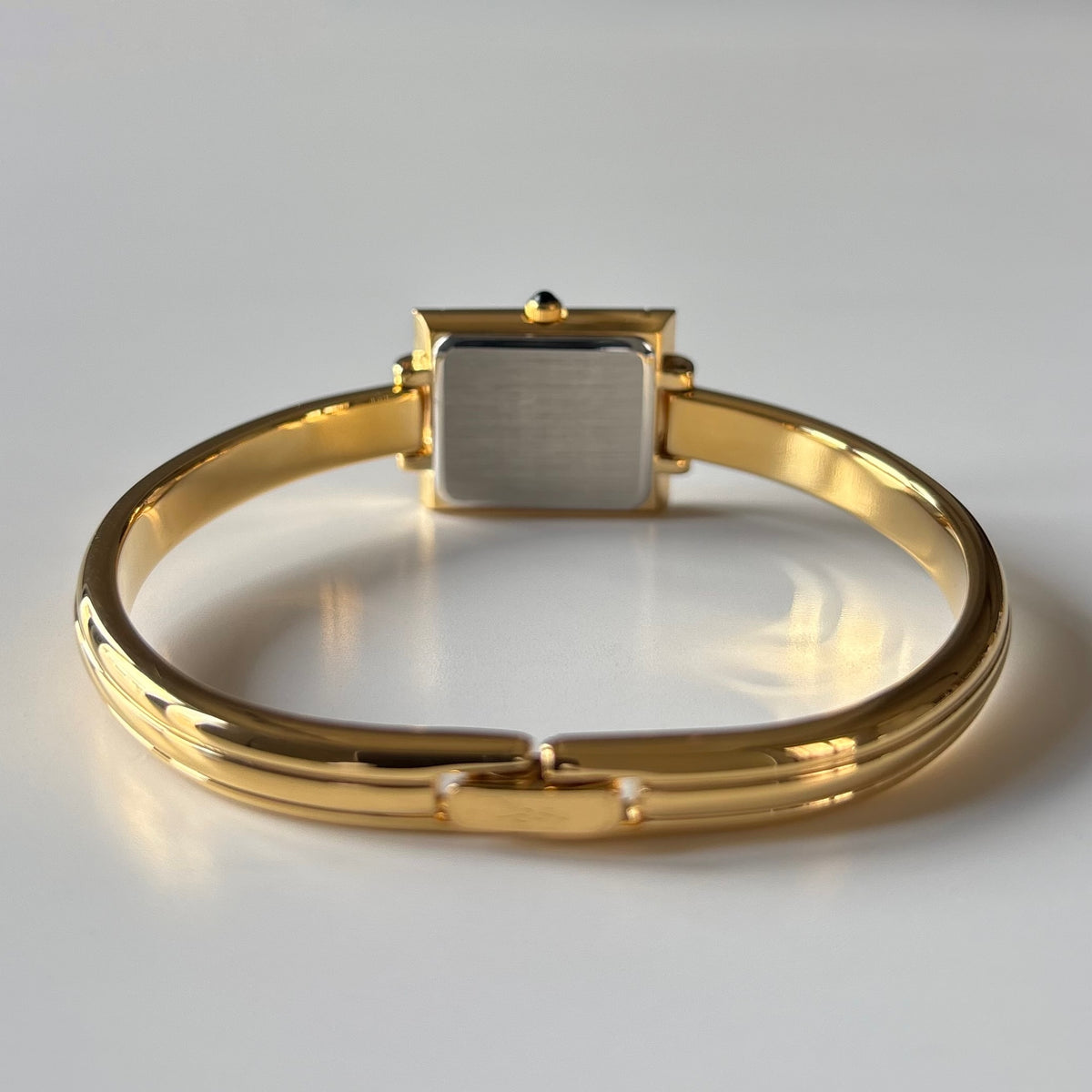 Yves Saint Laurent 1990s Seashell Dial Gold Plated Bangle Watch