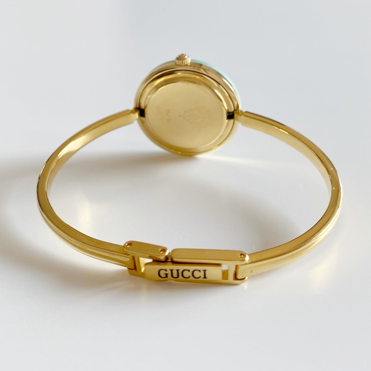 Gucci 1990s Interchangeable Bezel Gold Plated Bangle Watch with 12 bezels, case