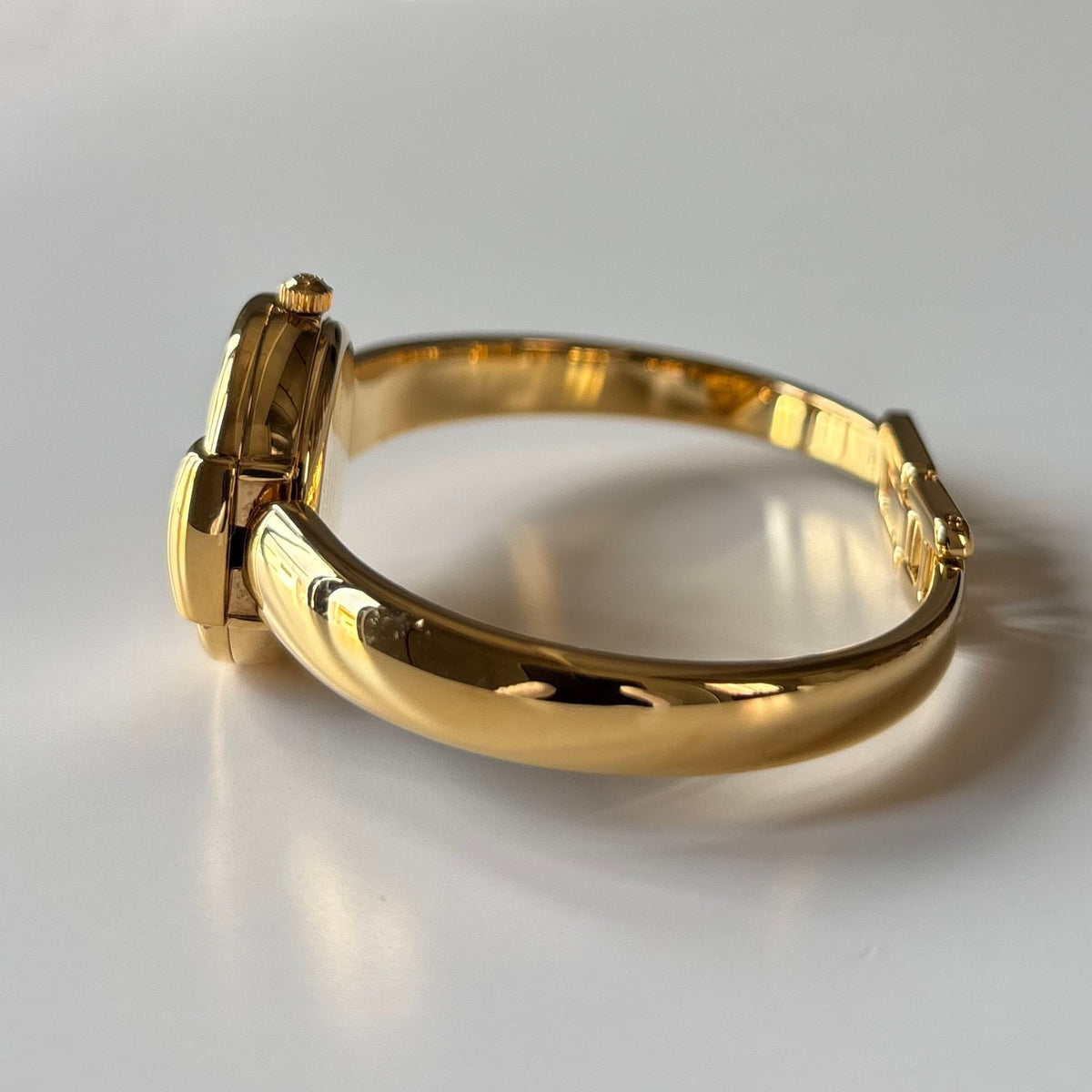 Gucci Round Dial Gold-Plated Bangle Watch