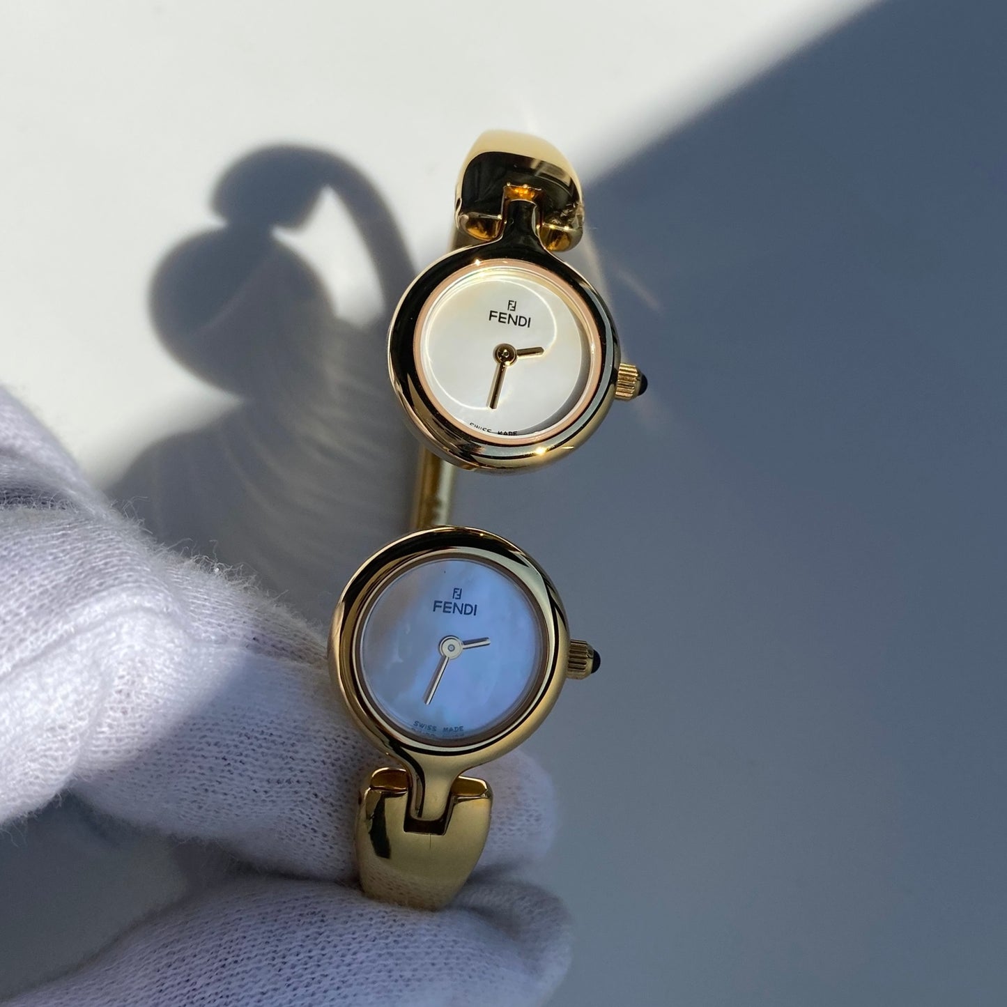 Fendi 1990s Seashell Dial Two Time Zone Gold Plated Bangle Watch