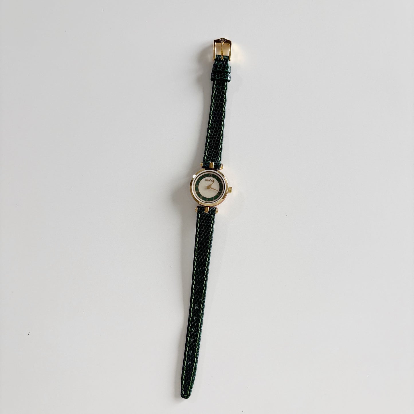 Gucci 1990s Round Dial Green Gold Plated Watch