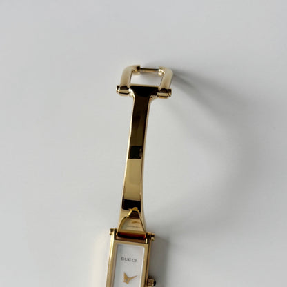 Gucci 1990s Seashell Rectangular Dial Gold Plated Bangle Watch