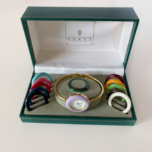 Gucci 1990s Interchangeable Bezel Gold-Plated Bangle Watch with 12 Bezels and Case (Small)