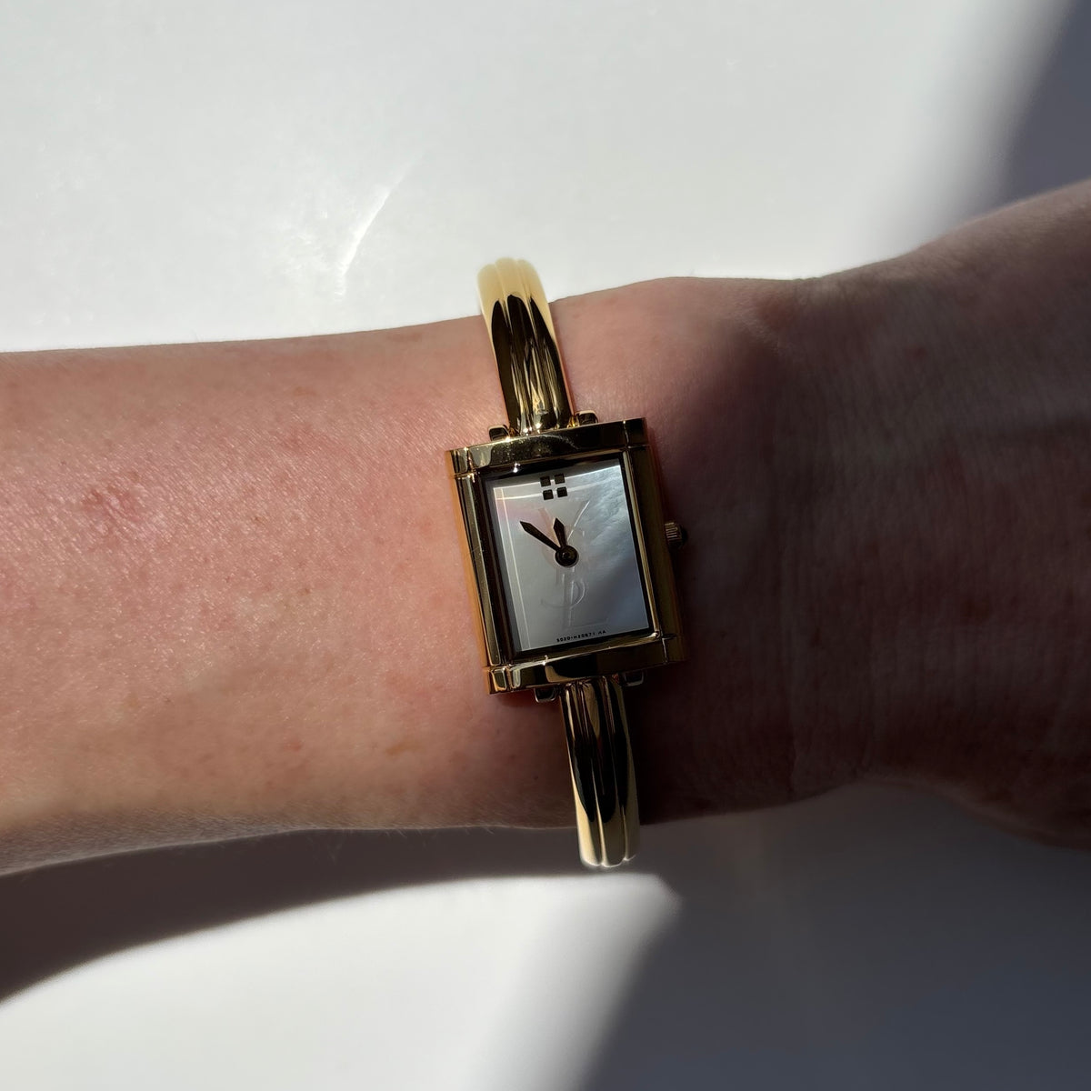 Yves Saint Laurent 1990s Seashell Dial Gold Plated Bangle Watch