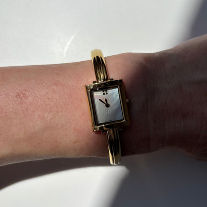 Yves Saint Laurent 1990s Seashell Dial Gold Plated Bangle Watch