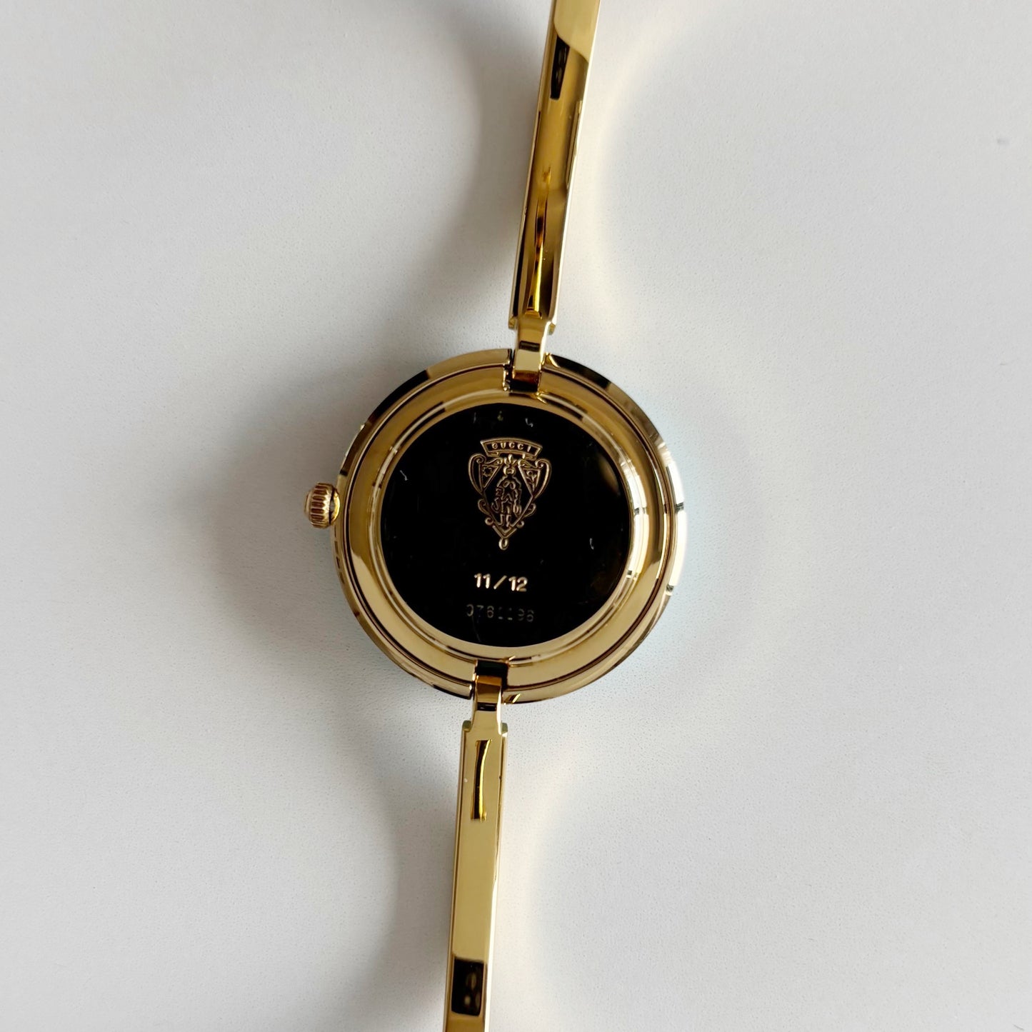 Gucci 1990s Interchangeable Bezel Gold Plated Bangle Watch with 12 bezels, case