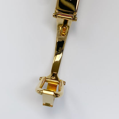 Gucci 1990s Rectangular Gold Dial Gold Plated Bangle Watch (Small)