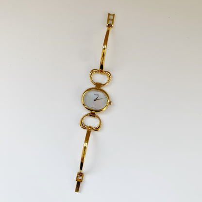 Gucci 1990s Seashell Dial Oval Gold Plated Bangle Watch