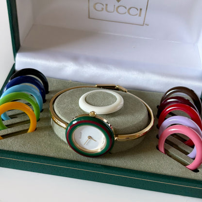 Gucci 1990s Interchangeable Bezel Gold Plated Bangle Watch with 12 bezels, case