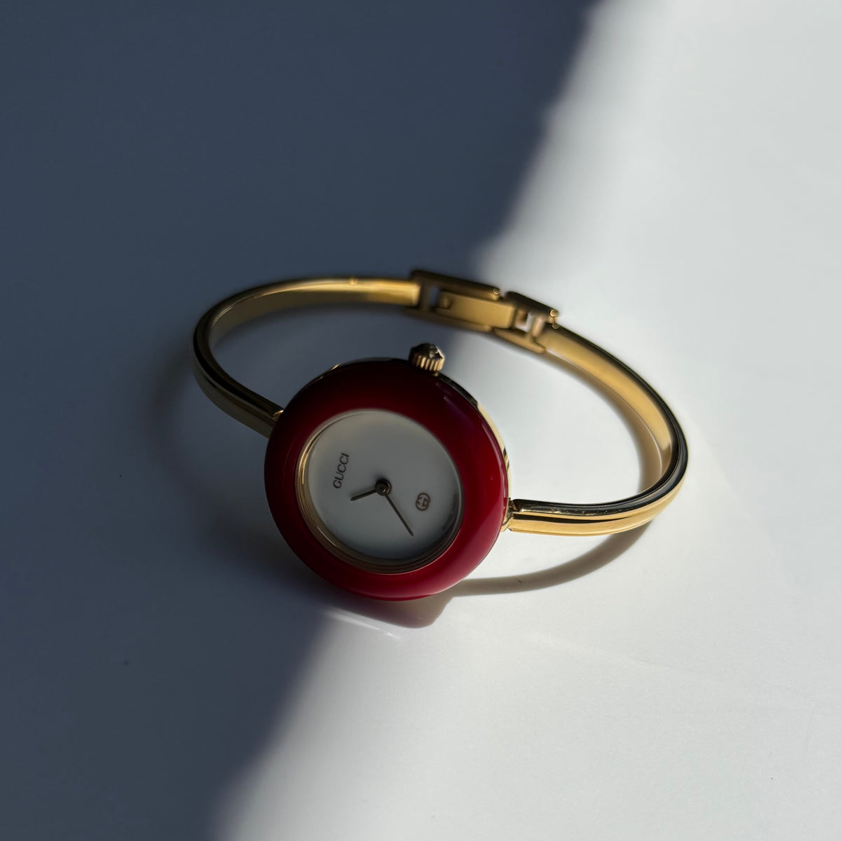Gucci 1990s Interchangeable Bezel Gold Plated Bangle Watch with 12 bezels, case