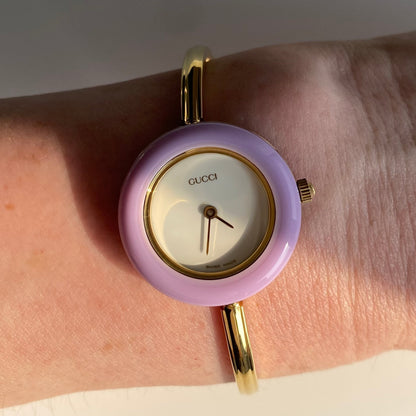 Gucci 1990s Interchangeable Bezel Gold Plated Bangle Watch with 12 bezels, case