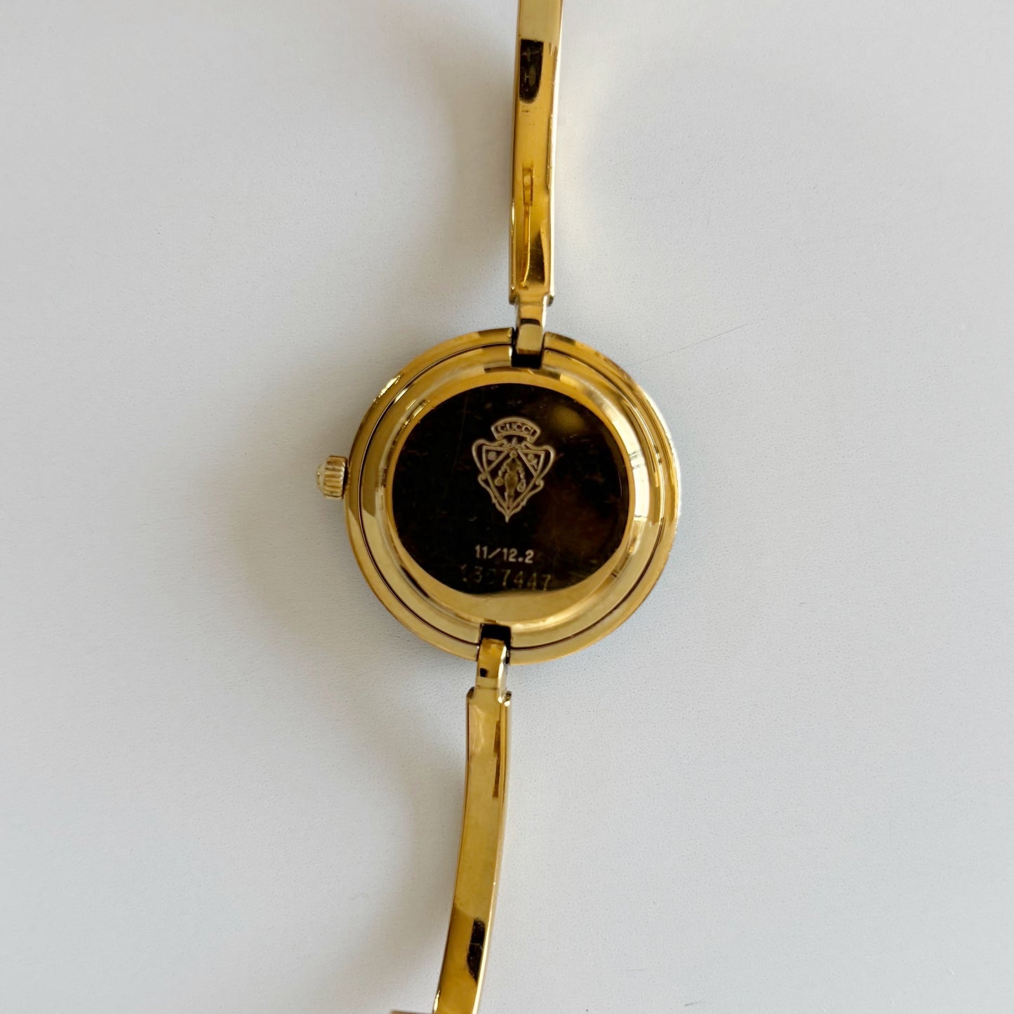 Gucci 1990s Interchangeable Bezel Gold Plated Bangle Watch with 12 bezels, case