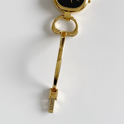 Gucci 1990s Black Dial Gold Plated Bangle Watch
