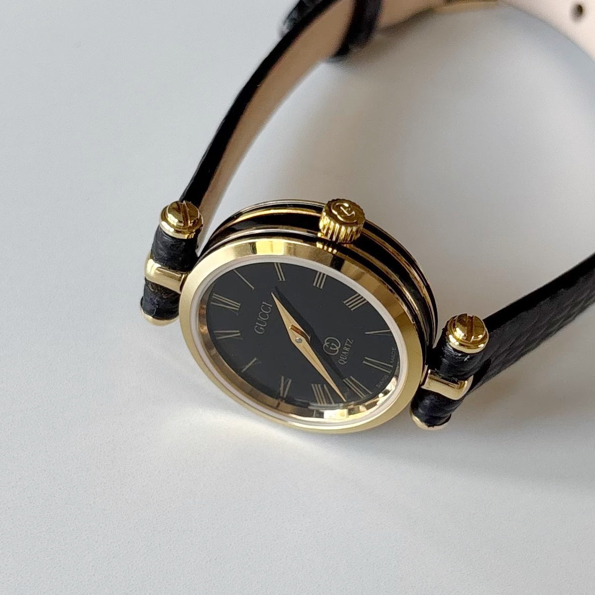 Gucci 1980s Black Round Dial Gold Plated Watch
