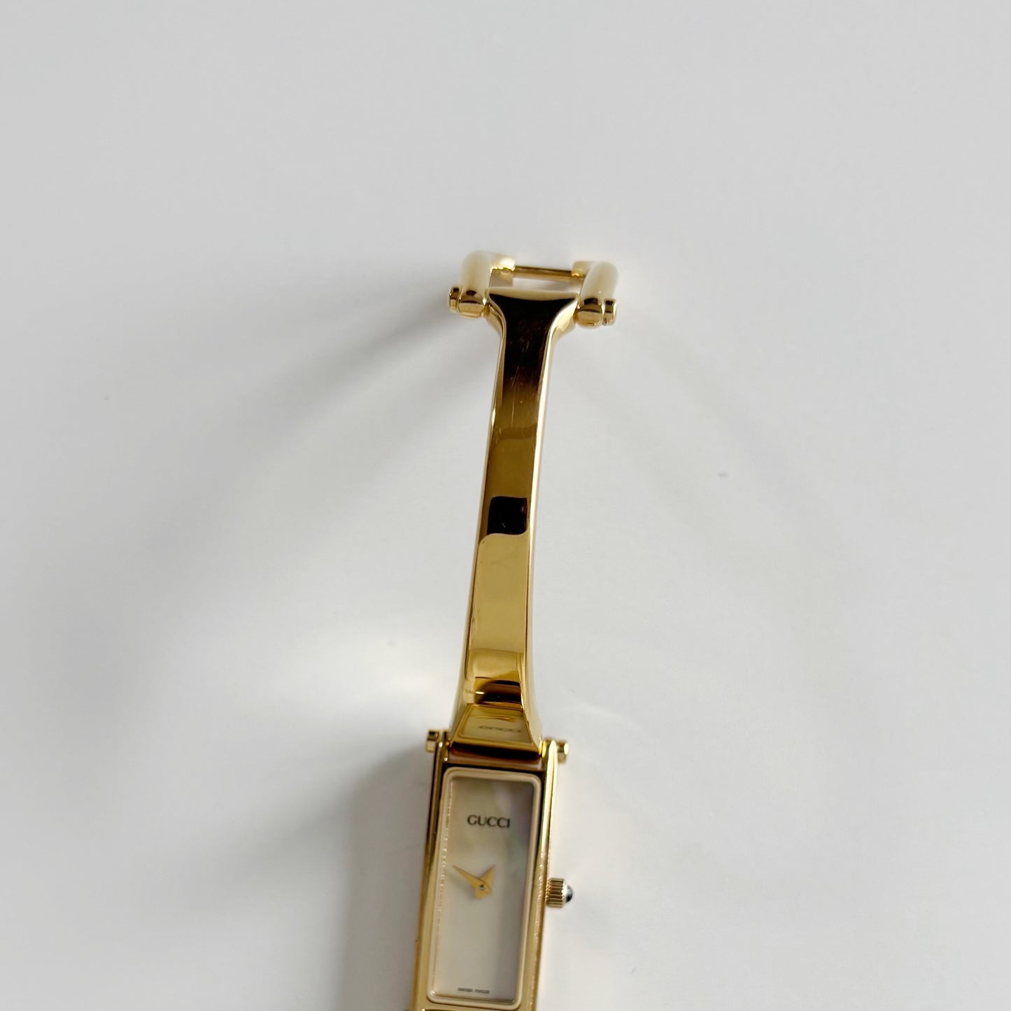 Gucci 1990s Rectangular Seashell Dial Gold Plated Bangle Watch